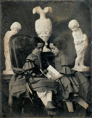 Two Girls Looking at a Picture Book (Bibliothèque Nationale de France, c. 1850–1855)